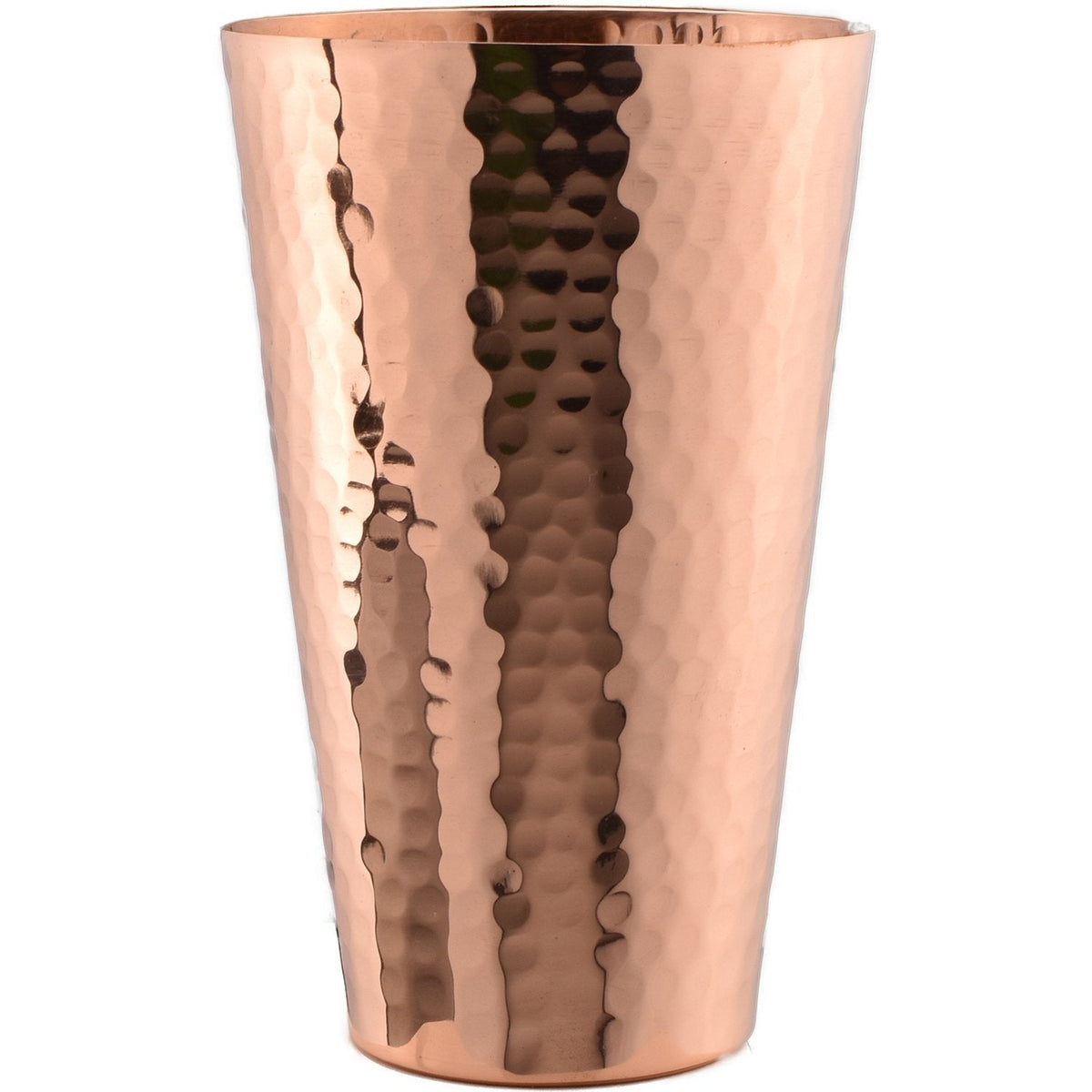 Handcrafted 18-ounce hammered copper tumbler with a polished, lustrous finish for cold beverages.