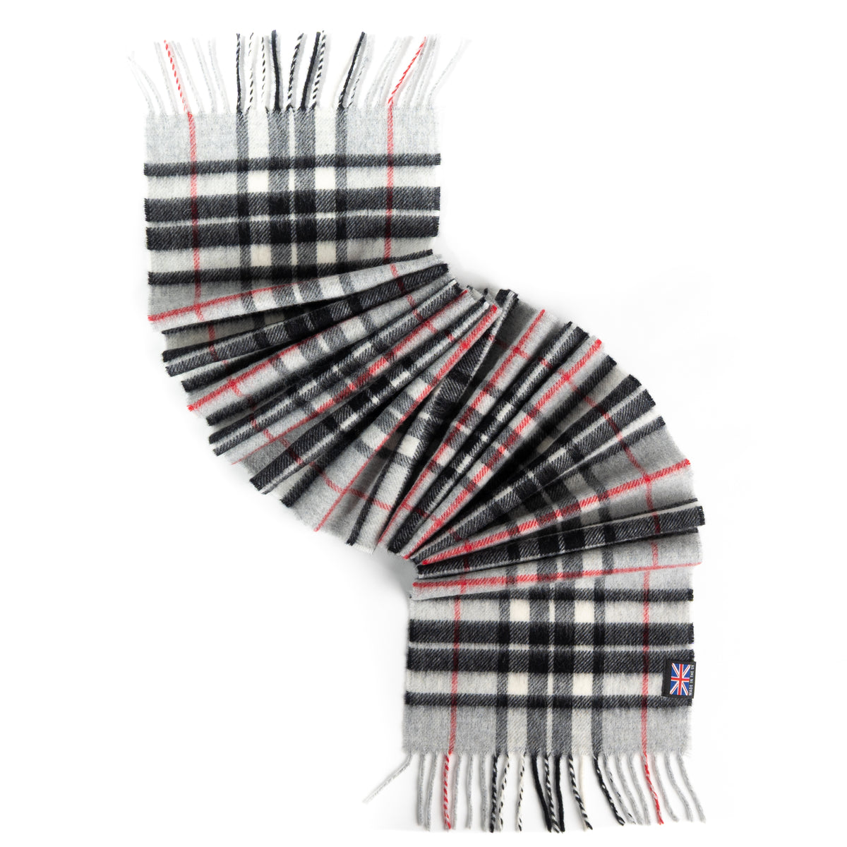 Grey Thompson tartan merino lambswool scarf with fringe ends, woven in the British Isles, isolated on white background.