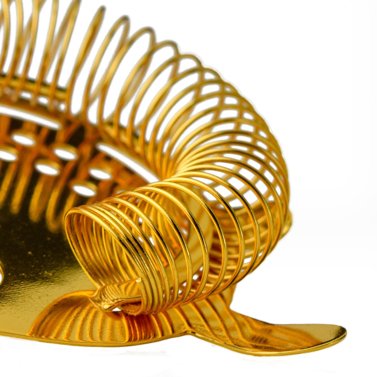 Luxury 24K gold-plated 4-prong cocktail strainer with a coiled wire spring and polished finish for professional bar use.