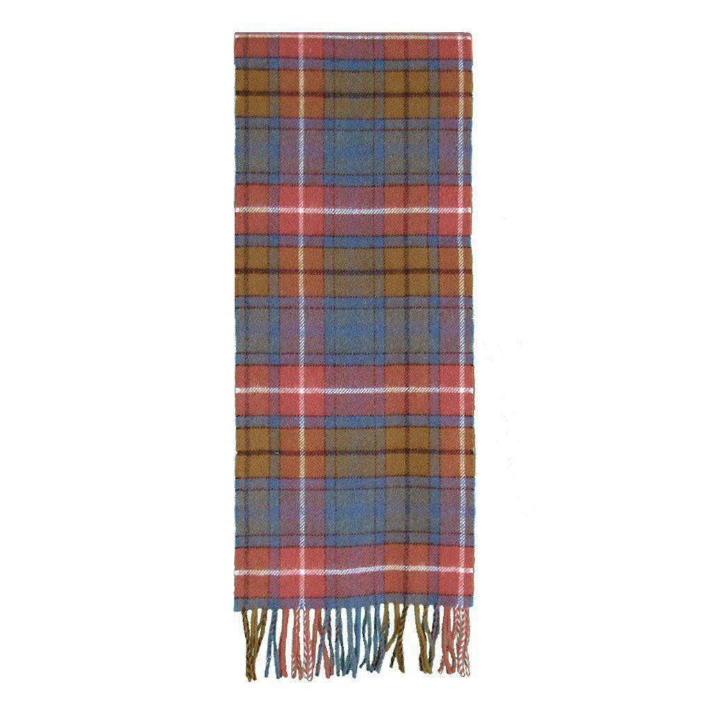 Antique Buchanan tartan merino lambswool scarf with a soft texture and classic fringed ends.