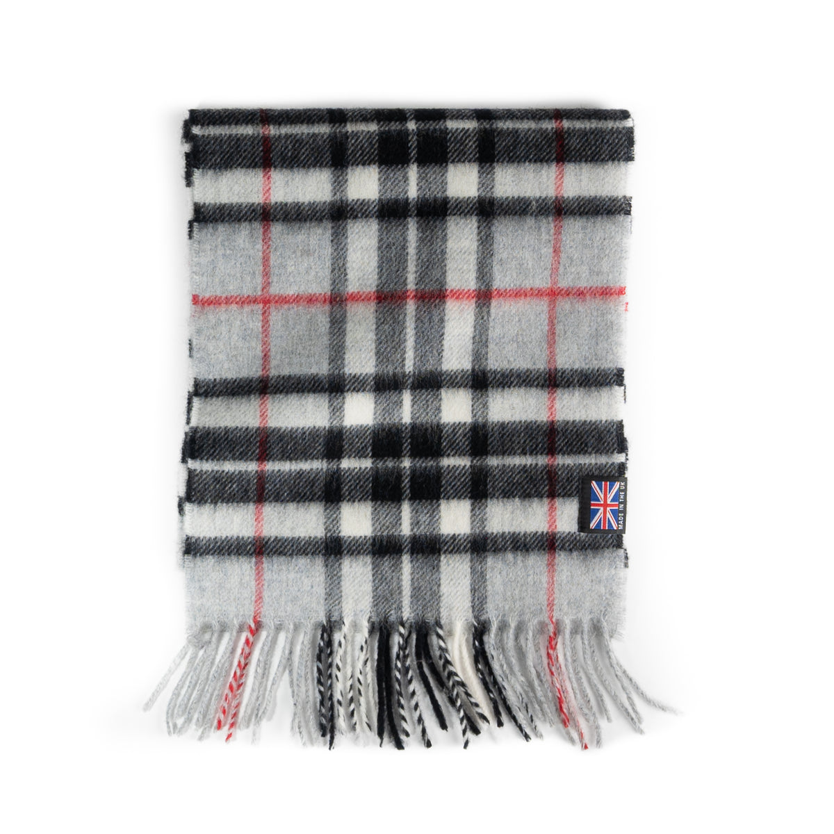 Grey Thompson tartan scarf in soft merino lambswool with a classic plaid pattern, fringe ends, and a Made in the UK label.